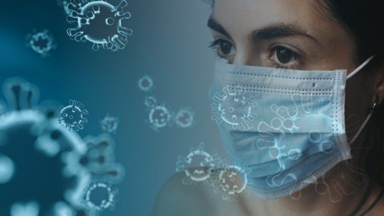 Employee in face mask when off ill paid leave coronavirus