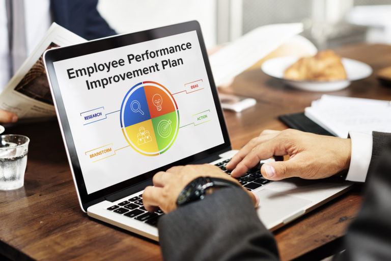 Laptop Screen Depicting a Performance Improvement Plan from an Employer