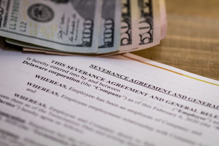 Image depicting severance pay and a severance agreement