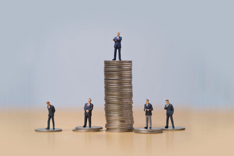 Disparities in salaries symbolize current executive compensation trends.