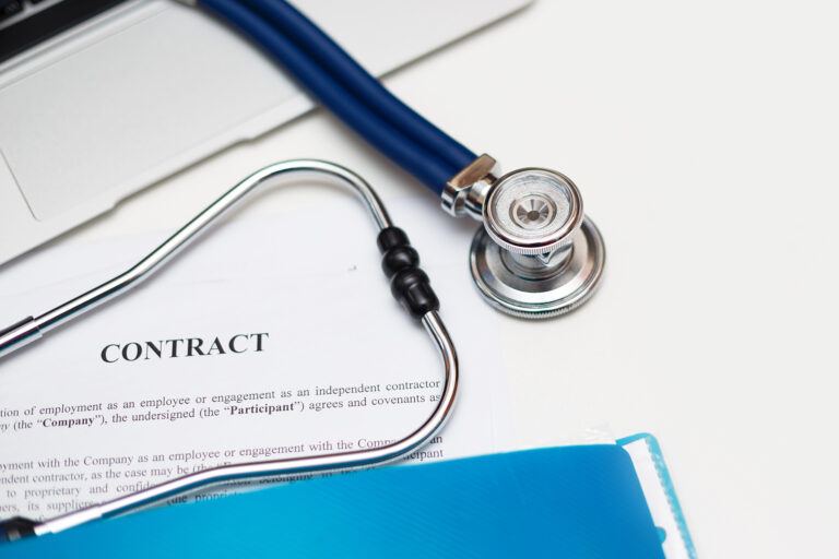 Physician contract with a stethoscope. Symbolizes medical professionals role in physician contract review