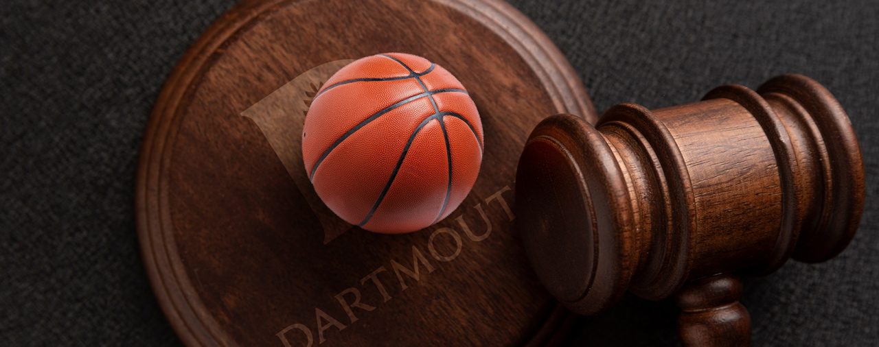 Judge gavel and Basket ball, top view on black background. Sport betting and law. Litigation
