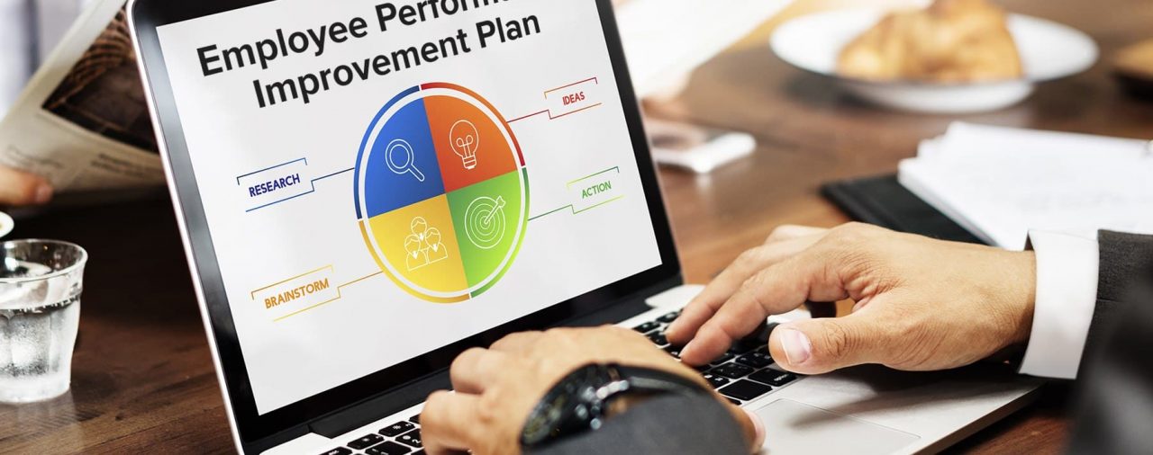 Laptop Screen Depicting a Performance Improvement Plan from an Employer