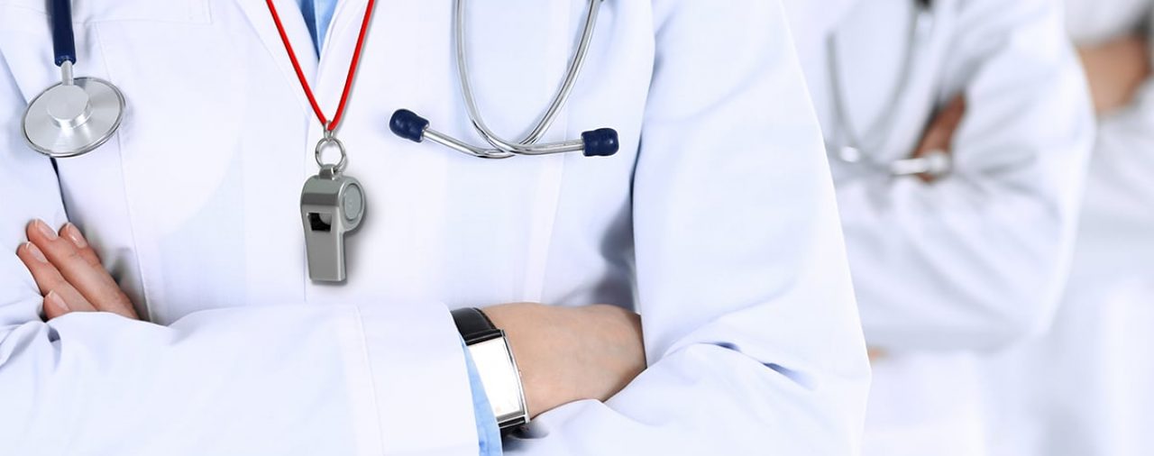 Group of modern doctors standing as a team with arms crossed in hospital office. Physicians ready to examine and help patients. Medical help, insurance in health care, best desease treatment and medicine concept.